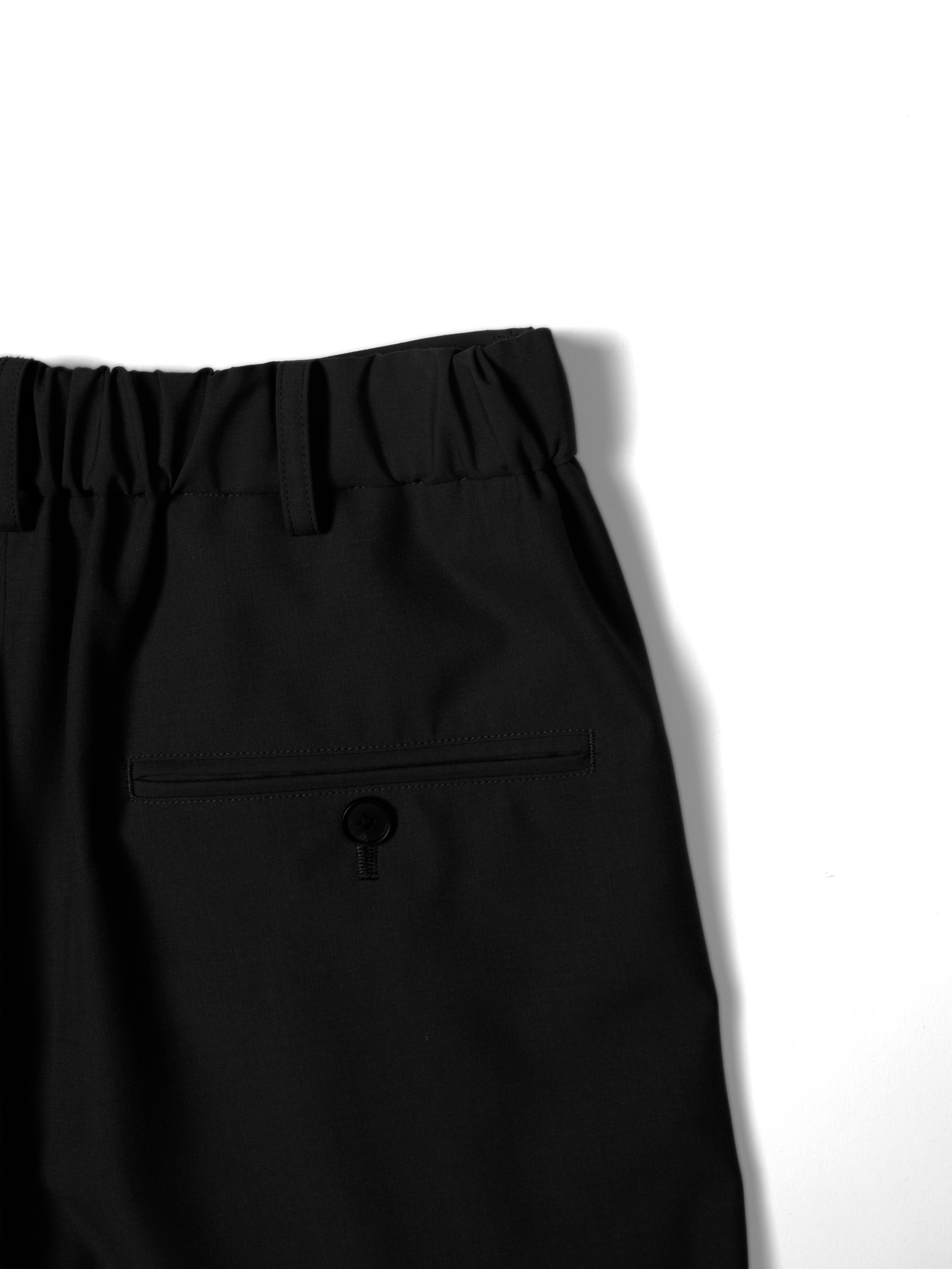Super130's WORSTED WOOL TROPICAL 2-TUCK EASY PANTS|BLACK – Cornier Super130's WORSTED WOOL TROPICAL 2-TUCK EASY PANTS|BLACK – Cornier